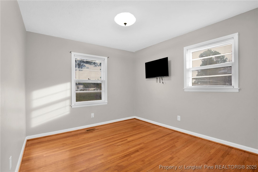 623 Isaac Weeks Road Clinton, NC 28328 - Photo 21 of 24 a view of an empty room with a window