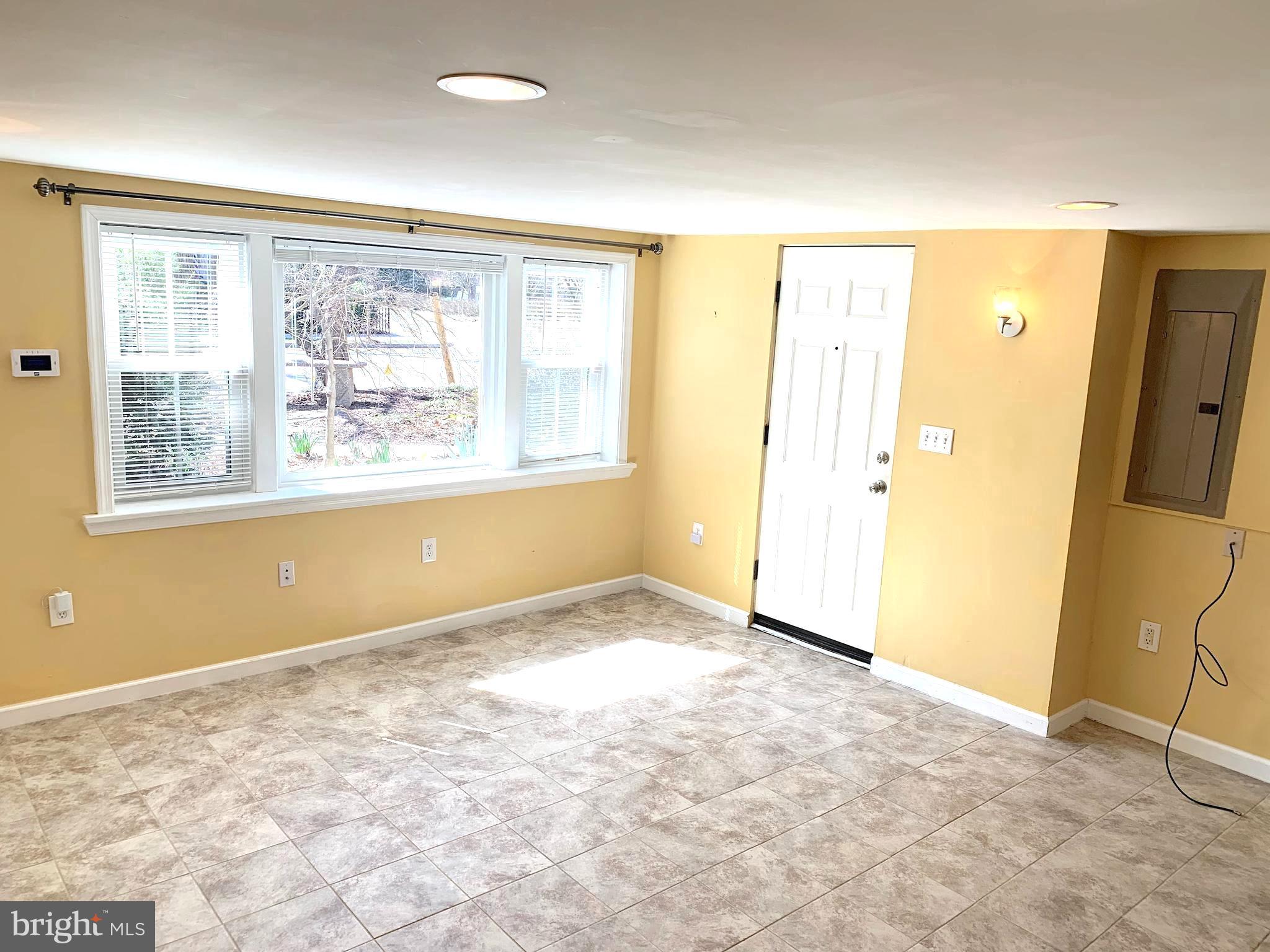 4459 MacArthur Boulevard Northwest, Unit LL Washington, DC 20007 - Photo 1 of 10 a view of an empty room with a window