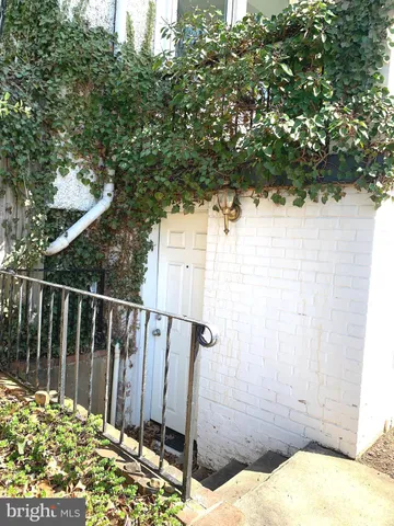 a view of balcony with wooden floor