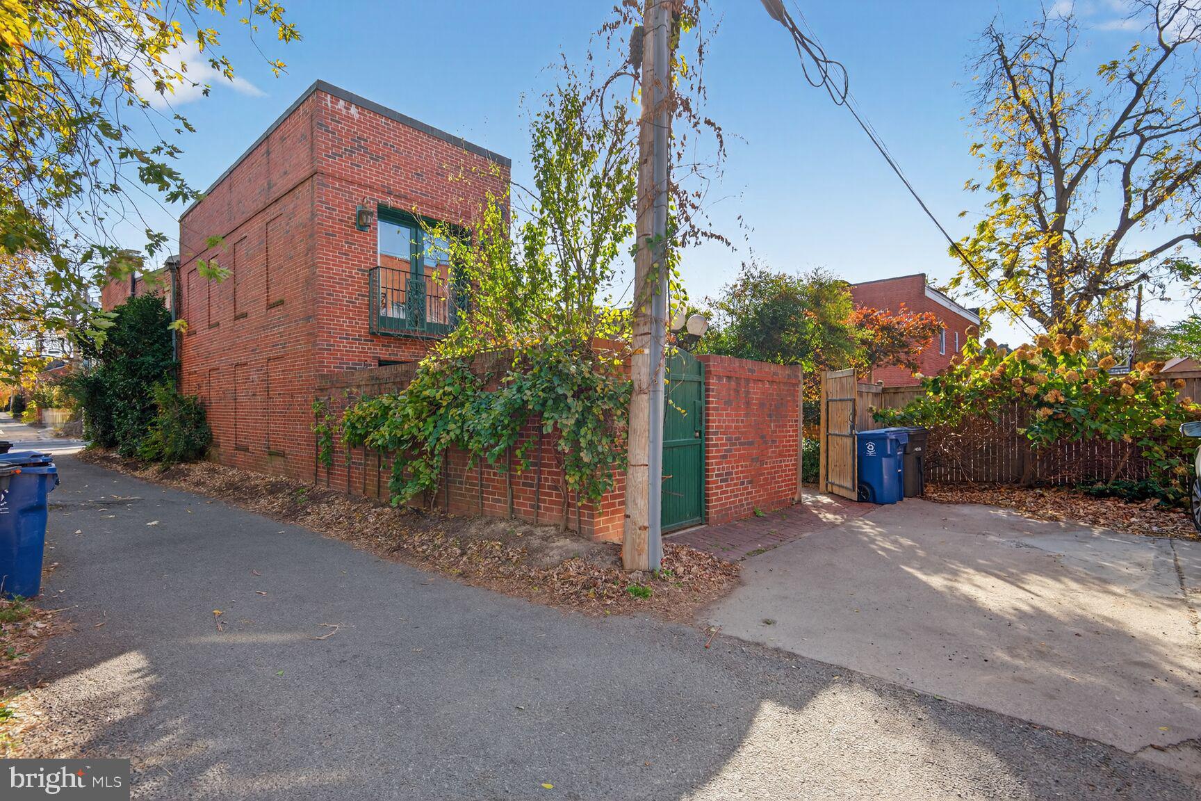220 North Patrick Street Alexandria, VA 22314 - Photo 15 of 15 a backyard of a house with plants and trees