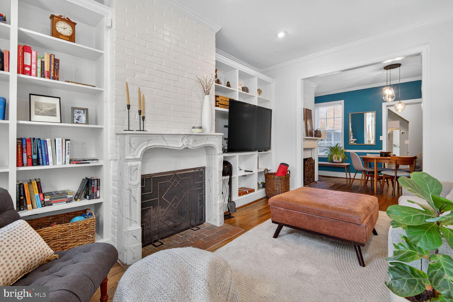 220 North Patrick Street Alexandria, VA 22314 - Photo 2 of 15 a living room with furniture and a flat screen tv