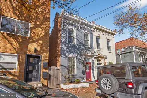 a view of a car park in front of a building
