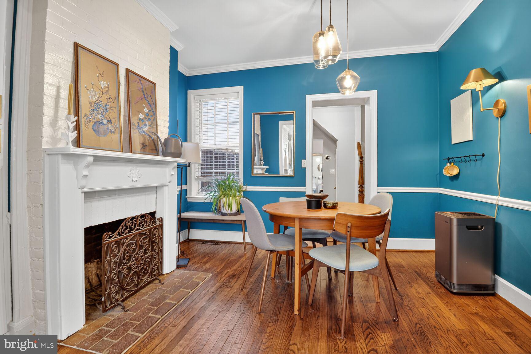220 North Patrick Street Alexandria, VA 22314 - Photo 4 of 15 a view of a dining room with furniture window and wooden floor