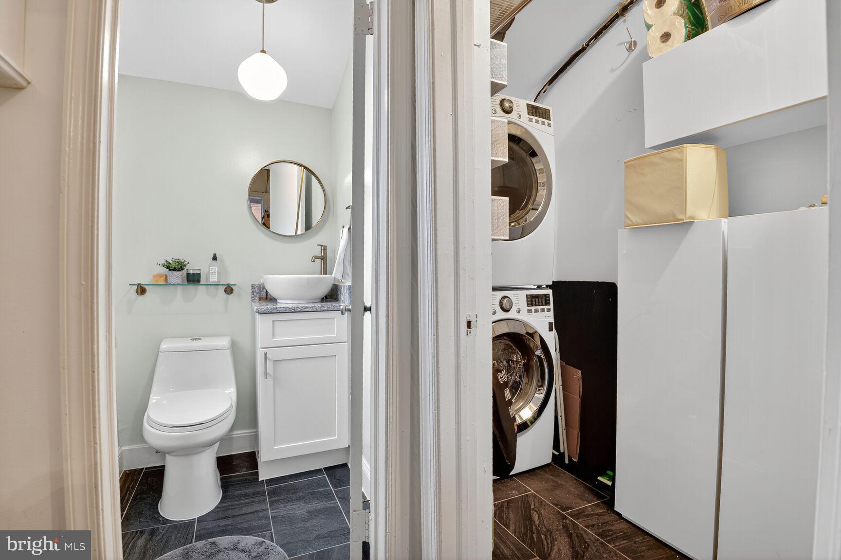 220 North Patrick Street Alexandria, VA 22314 - Photo 8 of 15 a bathroom with a toilet and a sink