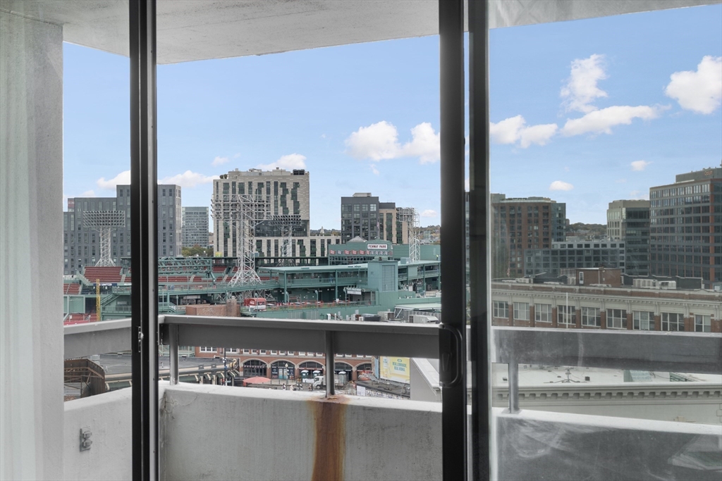 566 Commonwealth Avenue, Unit 1110 Boston, MA 02215 - Photo 4 of 13 a city view from a balcony with city view