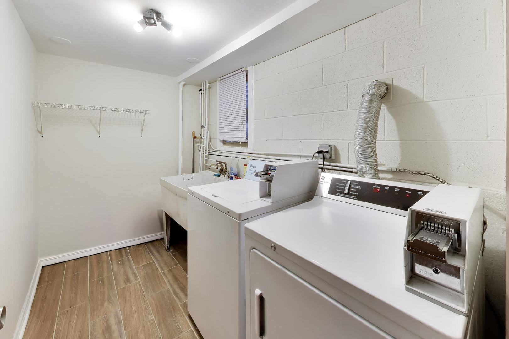 5057 West Dakin Street, Unit G Chicago, IL 60641 - Photo 15 of 19 a utility room with dryer and washer