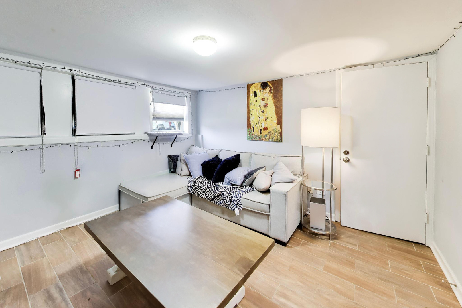 5057 West Dakin Street, Unit G Chicago, IL 60641 - Photo 5 of 19 a living room with furniture and a window