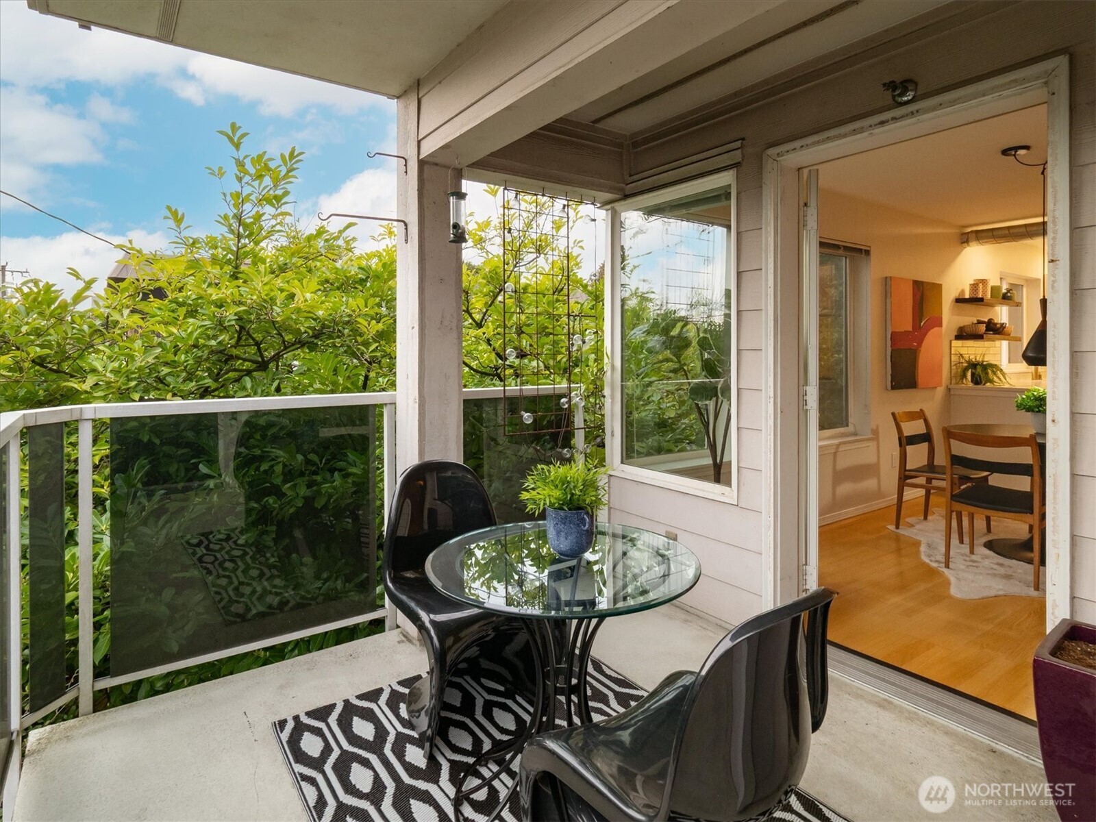 2024 Northwest 57th Street, Unit 201 Seattle, WA 98107 - Photo 7 of 29 a view of a outdoor seating area