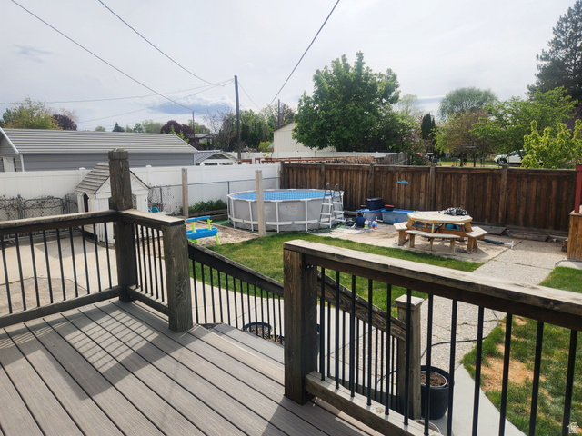 705 North 700 East Payson, UT 84651 - Photo 22 of 30 Wooden terrace with a patio and a fenced backyard