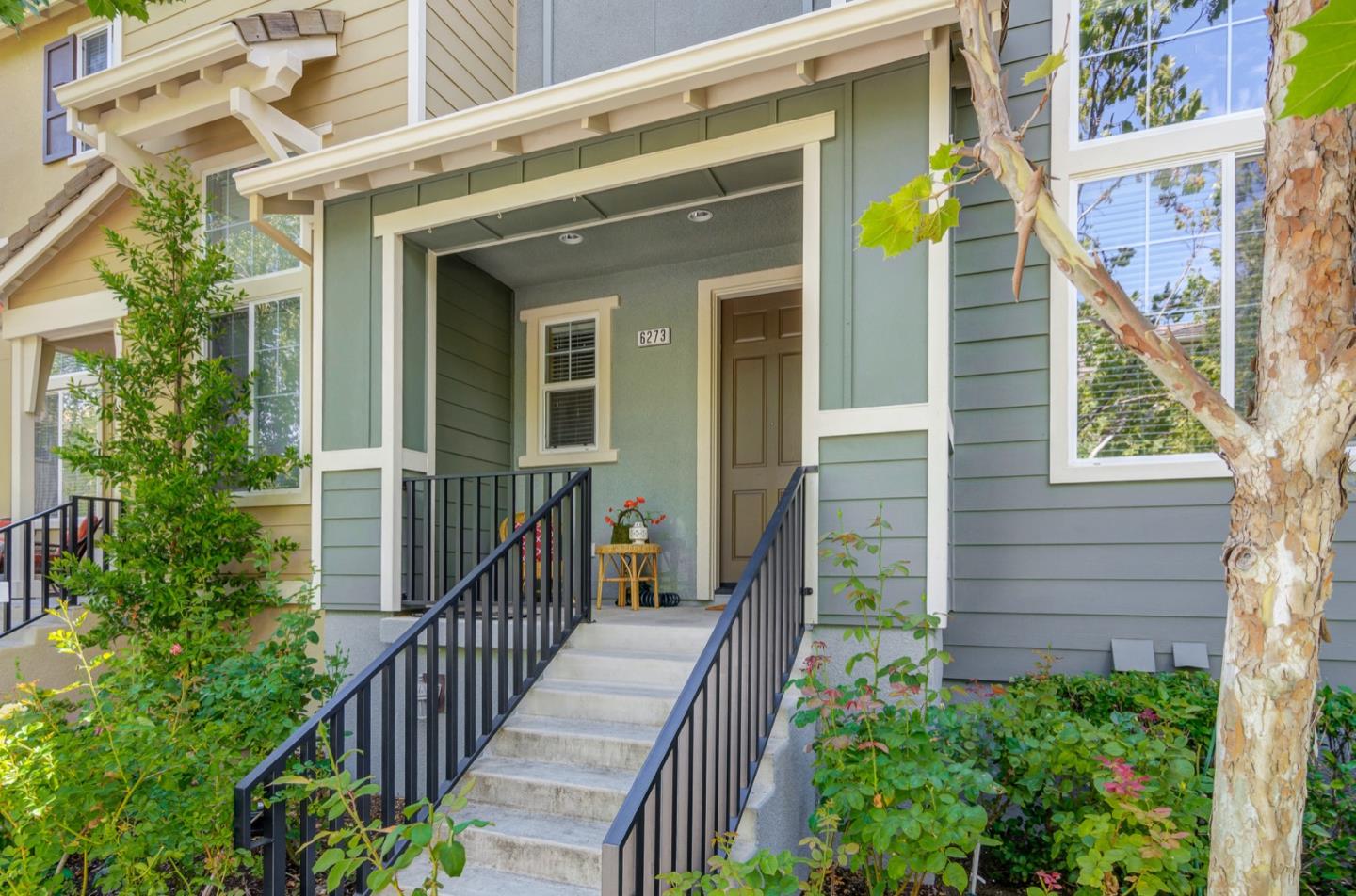 6273 Byron Lane San Ramon, CA 94582 - Photo 2 of 3 a view of a house with a small yard and wooden floor and a potted plant