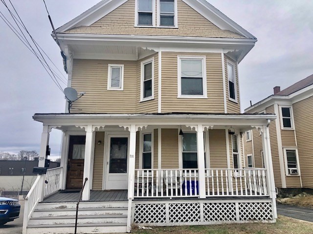 233 Washington Street, Unit 2 Malden, MA 02148 - Photo 1 of 13 a view of a house with entrance