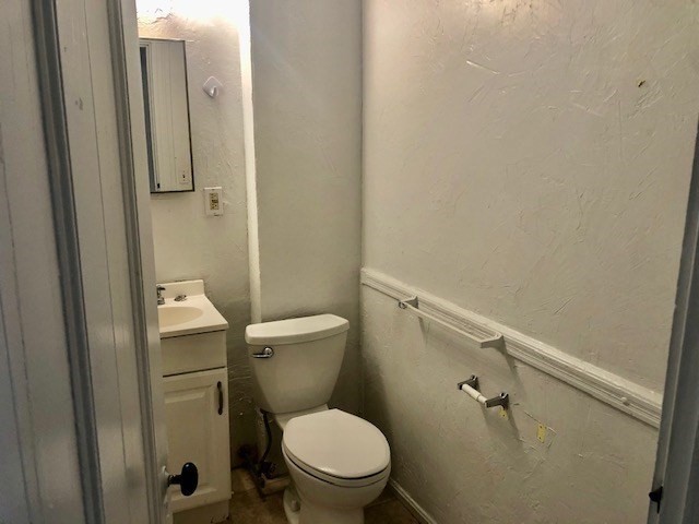 233 Washington Street, Unit 2 Malden, MA 02148 - Photo 10 of 13 a white toilet sitting next to a shower