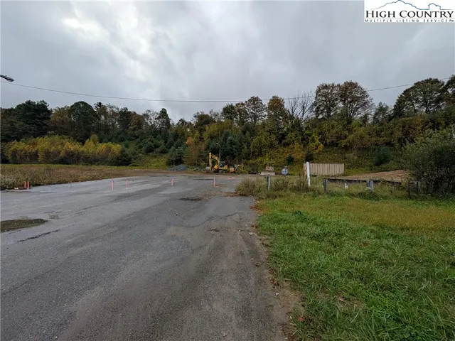 a view of a road with a yard