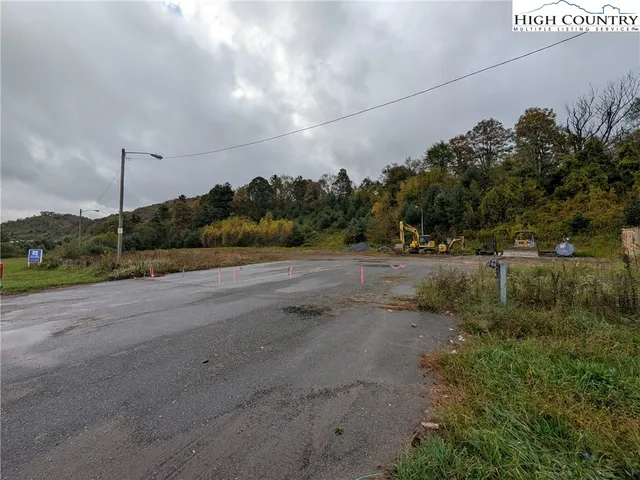 a view of a road with a yard