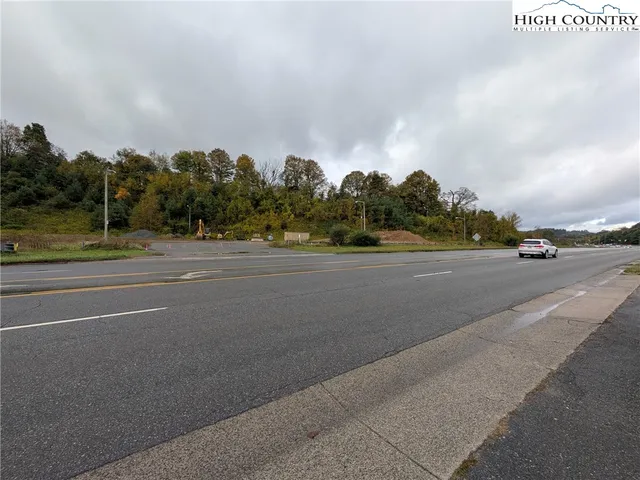 a black and white photo of a white wall