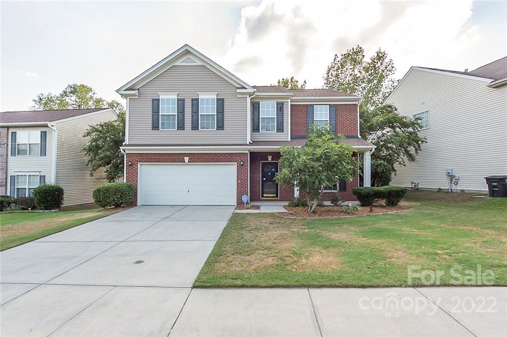 7632 Black Hawk Lane Tega Cay, SC 29708 - Photo 1 of 16 a front view of a house with a yard