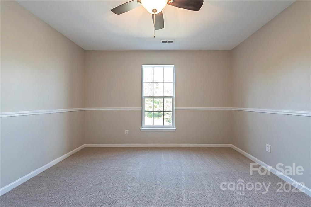 7632 Black Hawk Lane Tega Cay, SC 29708 - Photo 13 of 16 an empty room with a window