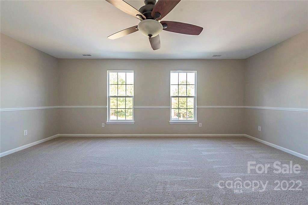 7632 Black Hawk Lane Tega Cay, SC 29708 - Photo 5 of 16 a view of an empty room with a window