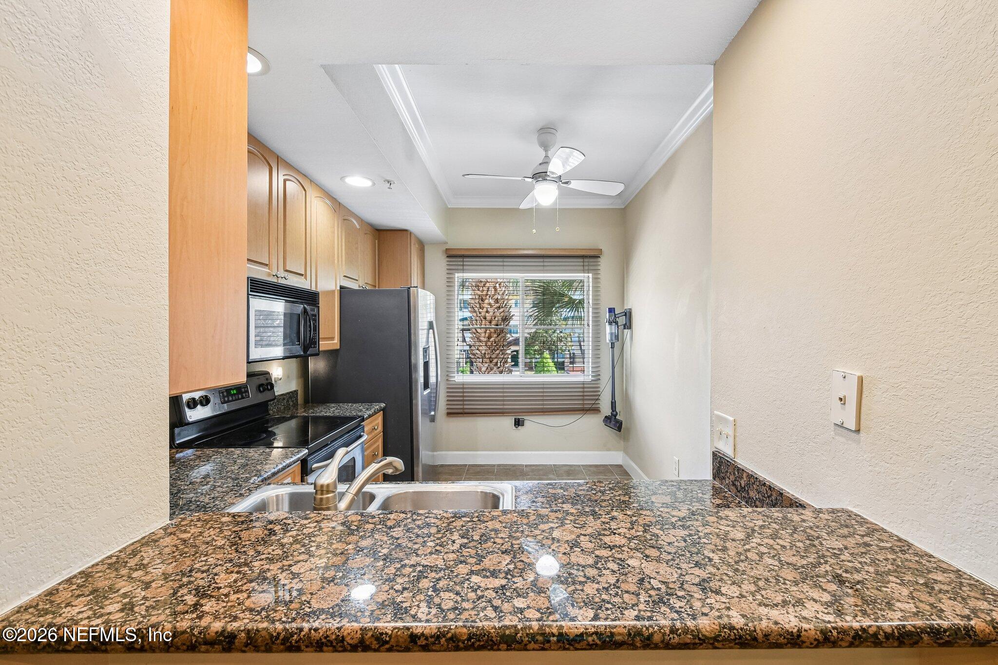 9745 Touchton Road, Unit 1129 Jacksonville, FL 32246 - Photo 20 of 57 Granite Countertop Breakfast Bar