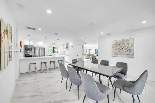 a view of a dining room with furniture