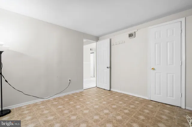 a view of an empty room and window