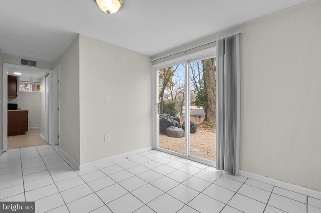 a bathroom with a sink a mirror and a shower