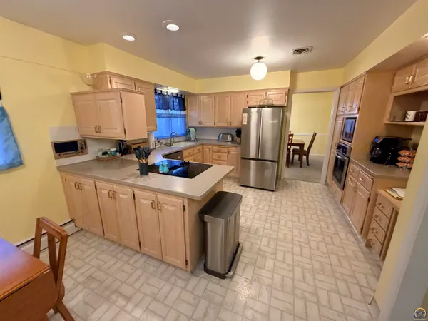 $350,000 | 2324 Southwest Meadow Court, Topeka, KS 66614