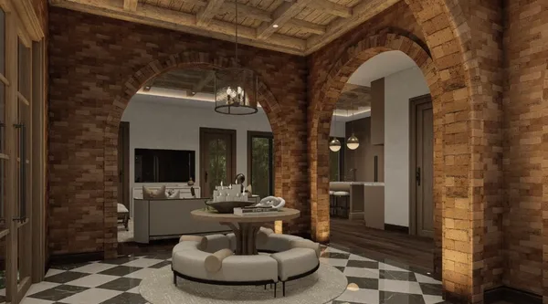 a lobby with furniture and a fireplace
