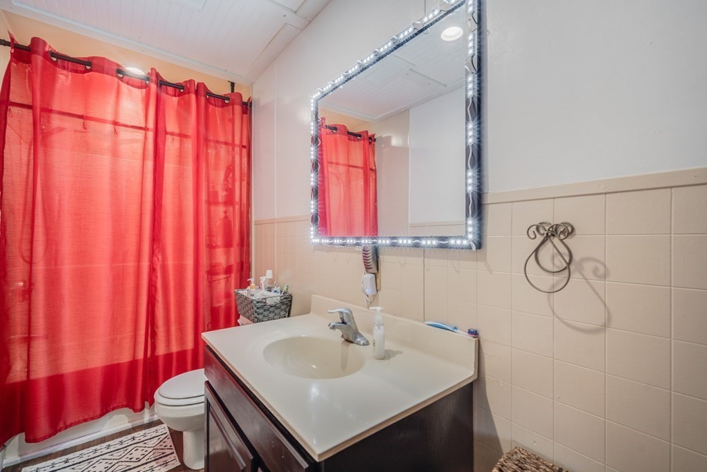 39 Hardwick Road Hardwick, MA 01031 - Photo 25 of 27 a bathroom with a sink and a mirror