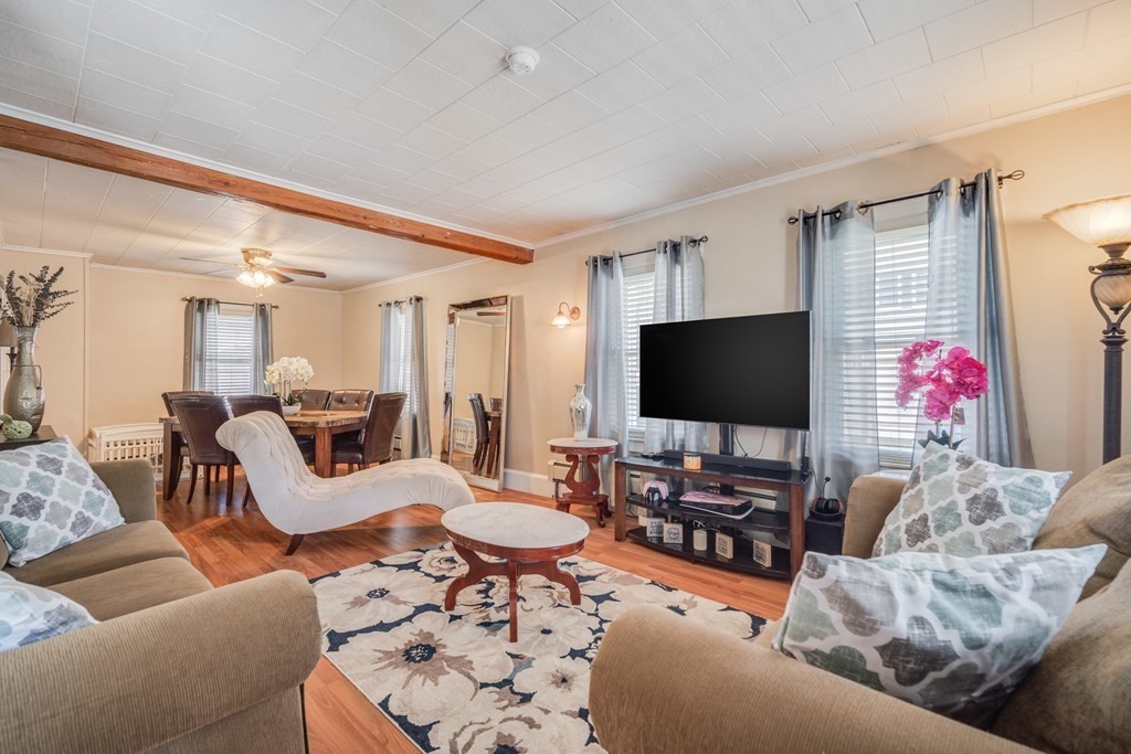 39 Hardwick Road Hardwick, MA 01031 - Photo 10 of 27 a living room with furniture and a flat screen tv