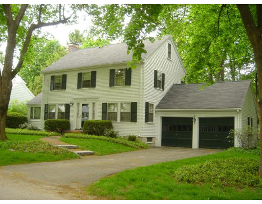 40 Appleby Road Wellesley, MA 02482 - Photo 1 of 1 a front view of a house with a yard and trees