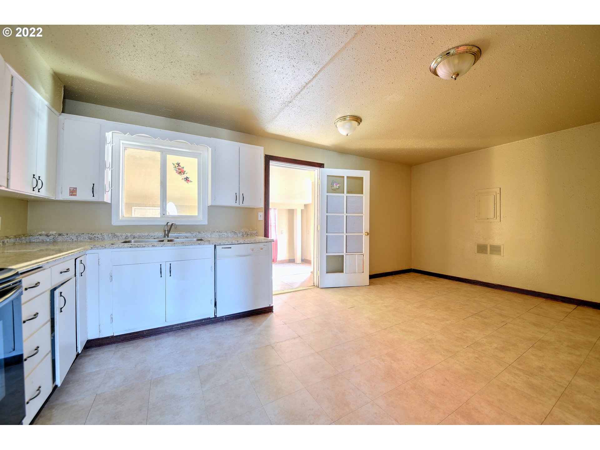 1273 Modoc Street Springfield, OR 97477 - Photo 14 of 16 a view of a kitchen with wooden cabinet
