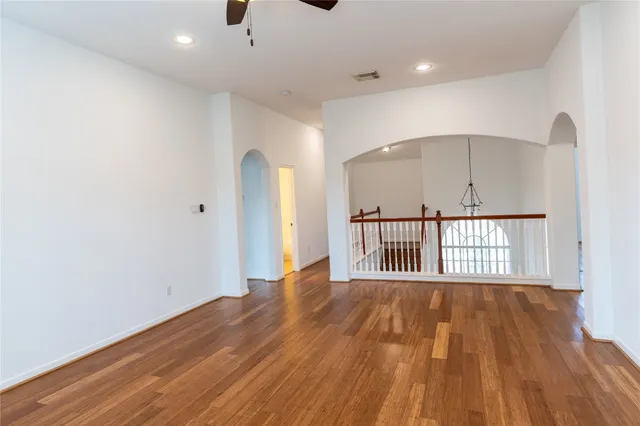 a spacious bathroom with a double vanity sink a mirror and shower