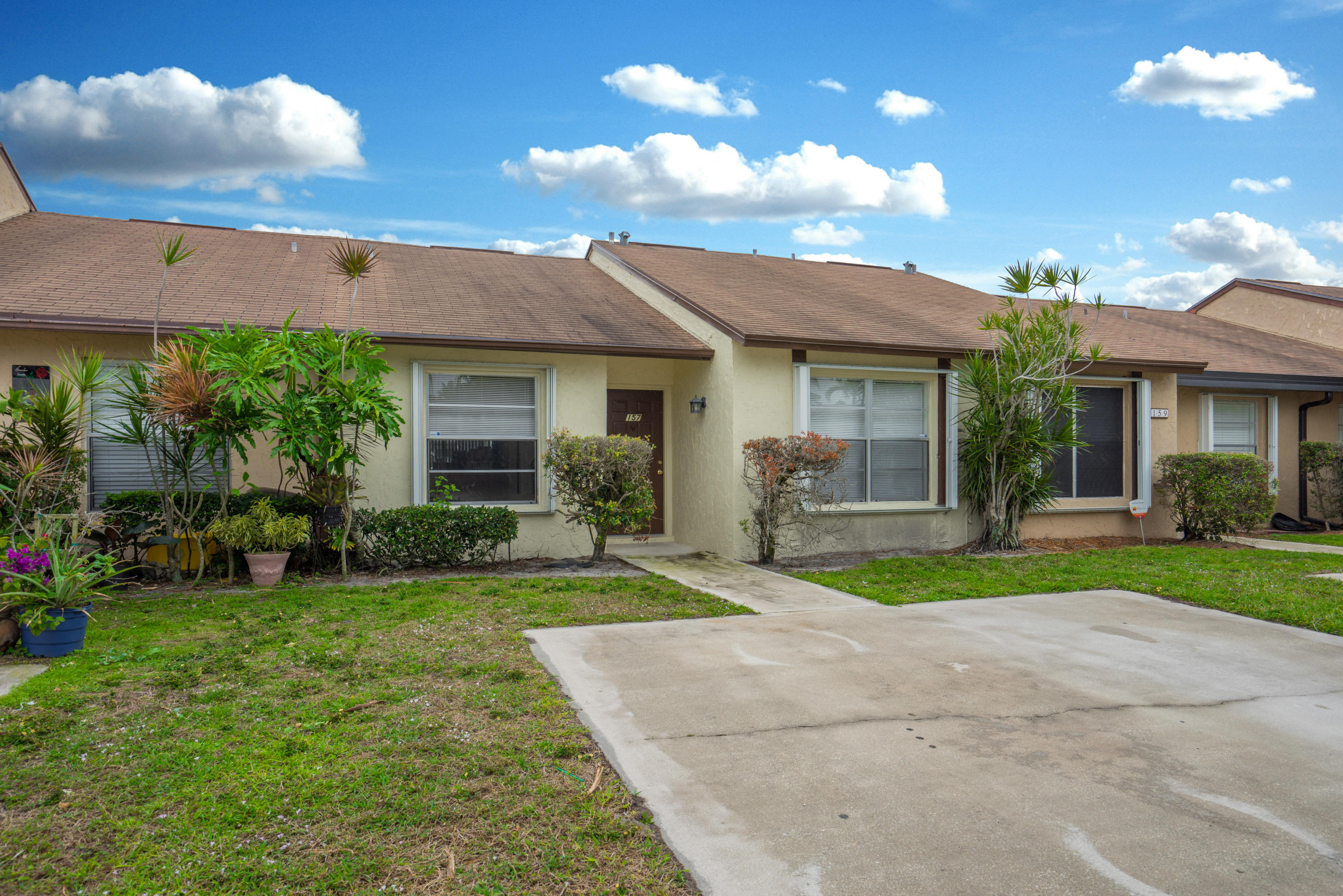 157 Pinewood Court Jupiter, FL 33458 - Photo 1 of 12 Exterior Front