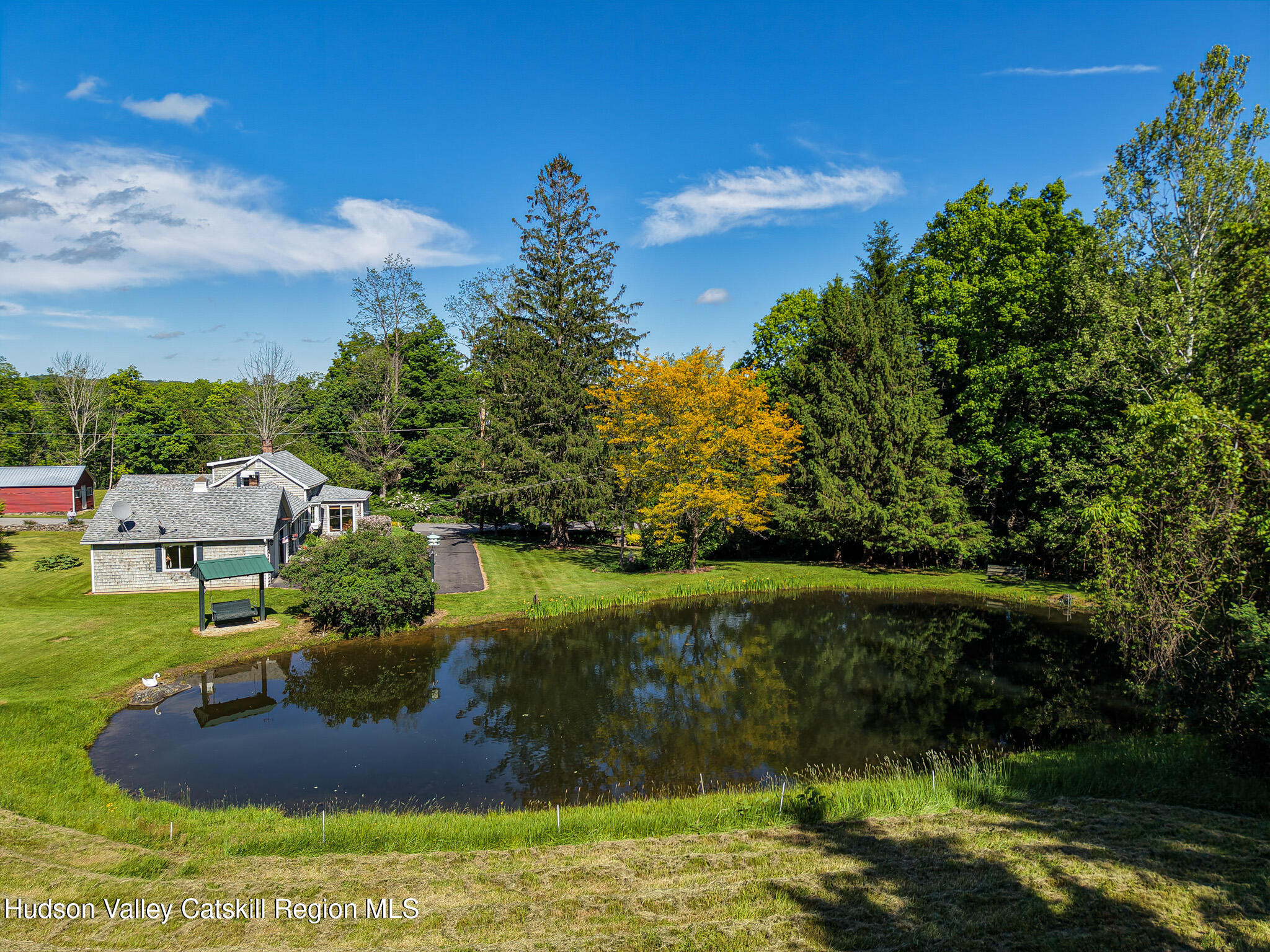 221 Camp Medusa Road Rensselaerville, NY 12120 - Photo 30 of 57 a view of a garden with a lake