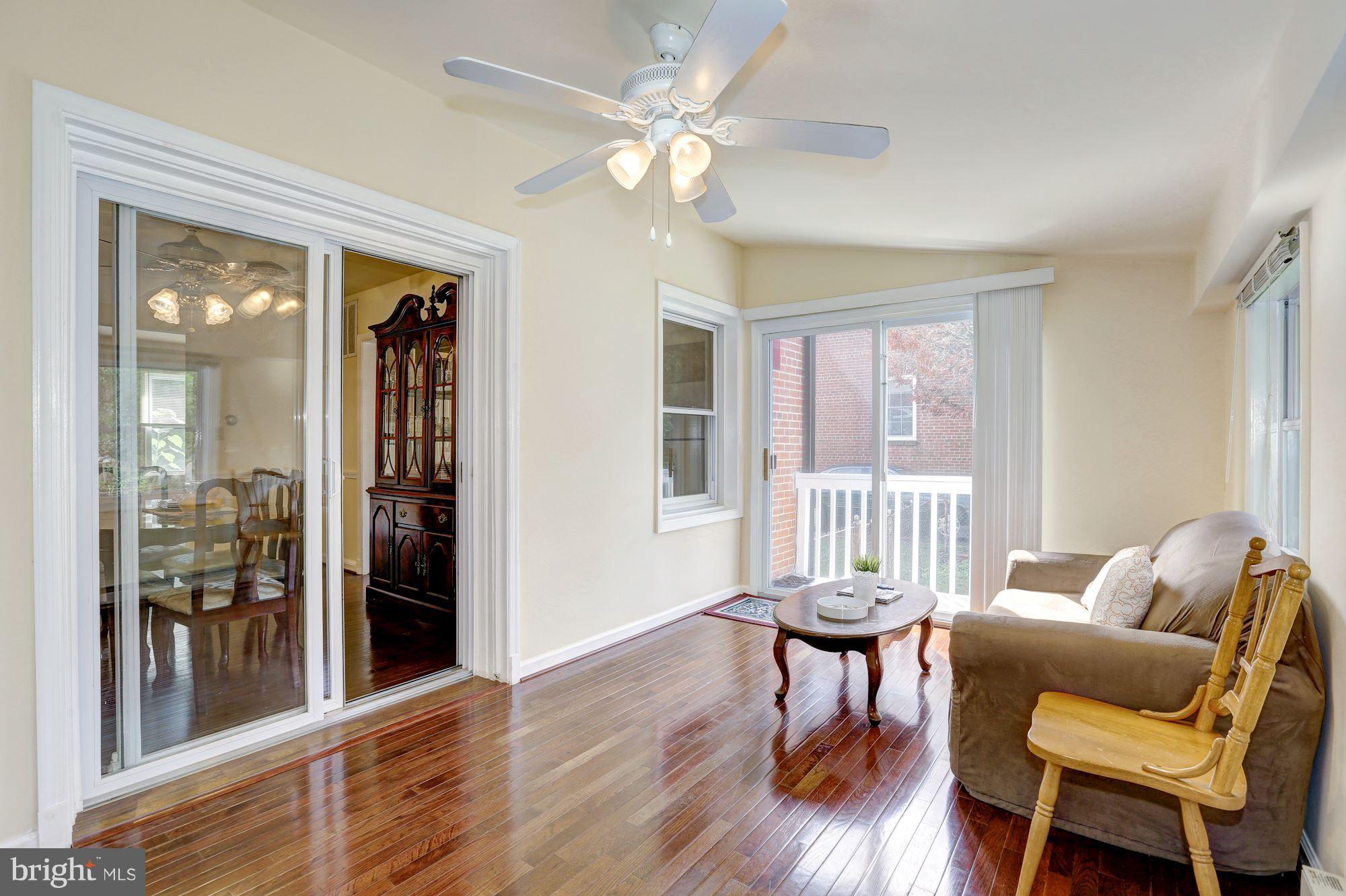 9428 Old Georgetown Road Bethesda, MD 20814 - Photo 11 of 30 Sun Room w/Sliding Door to Outside