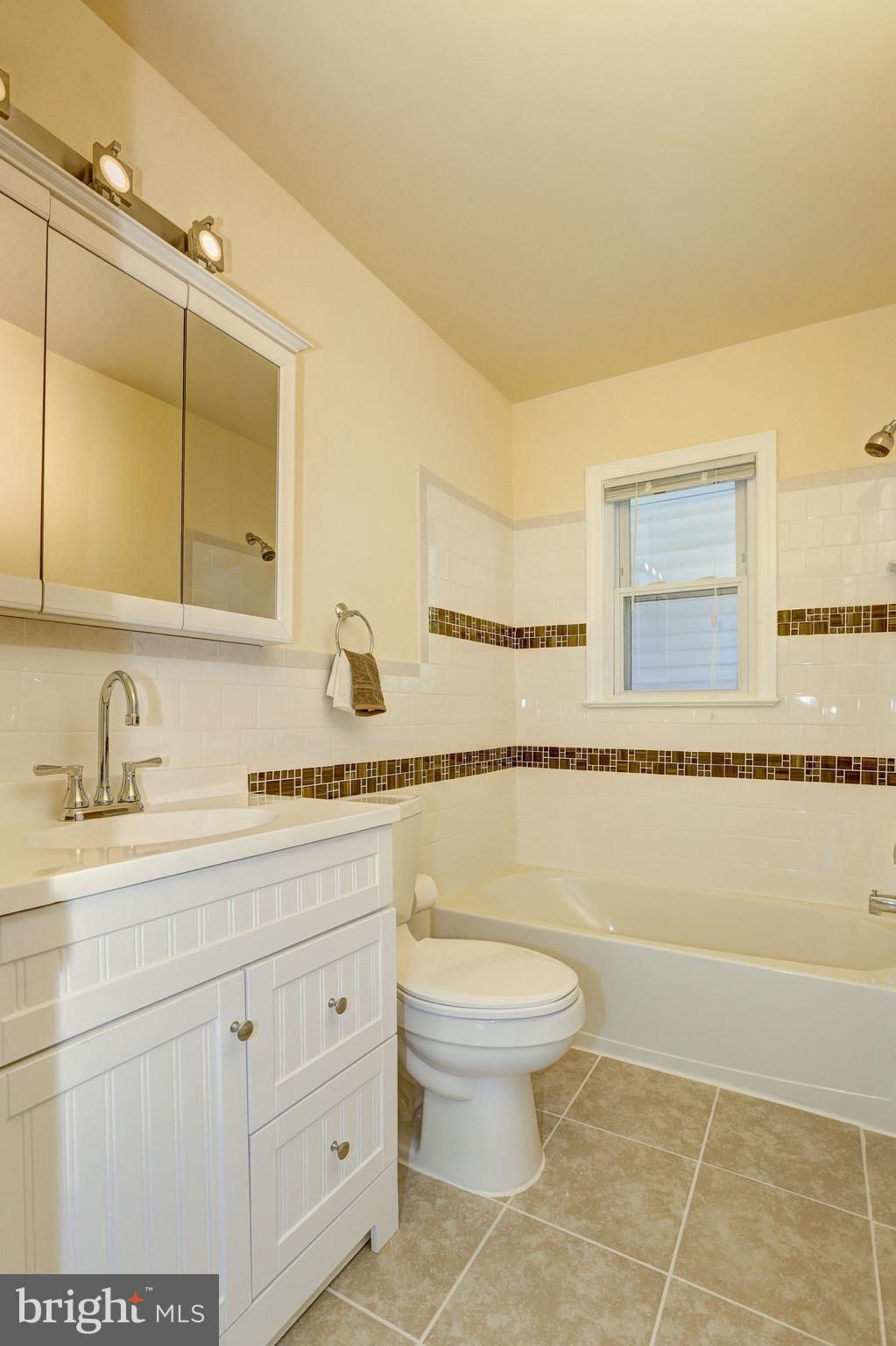 9428 Old Georgetown Road Bethesda, MD 20814 - Photo 12 of 30 Renovated Full Bath 1_Main Floor