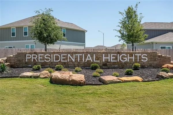 a front view of a building with garden