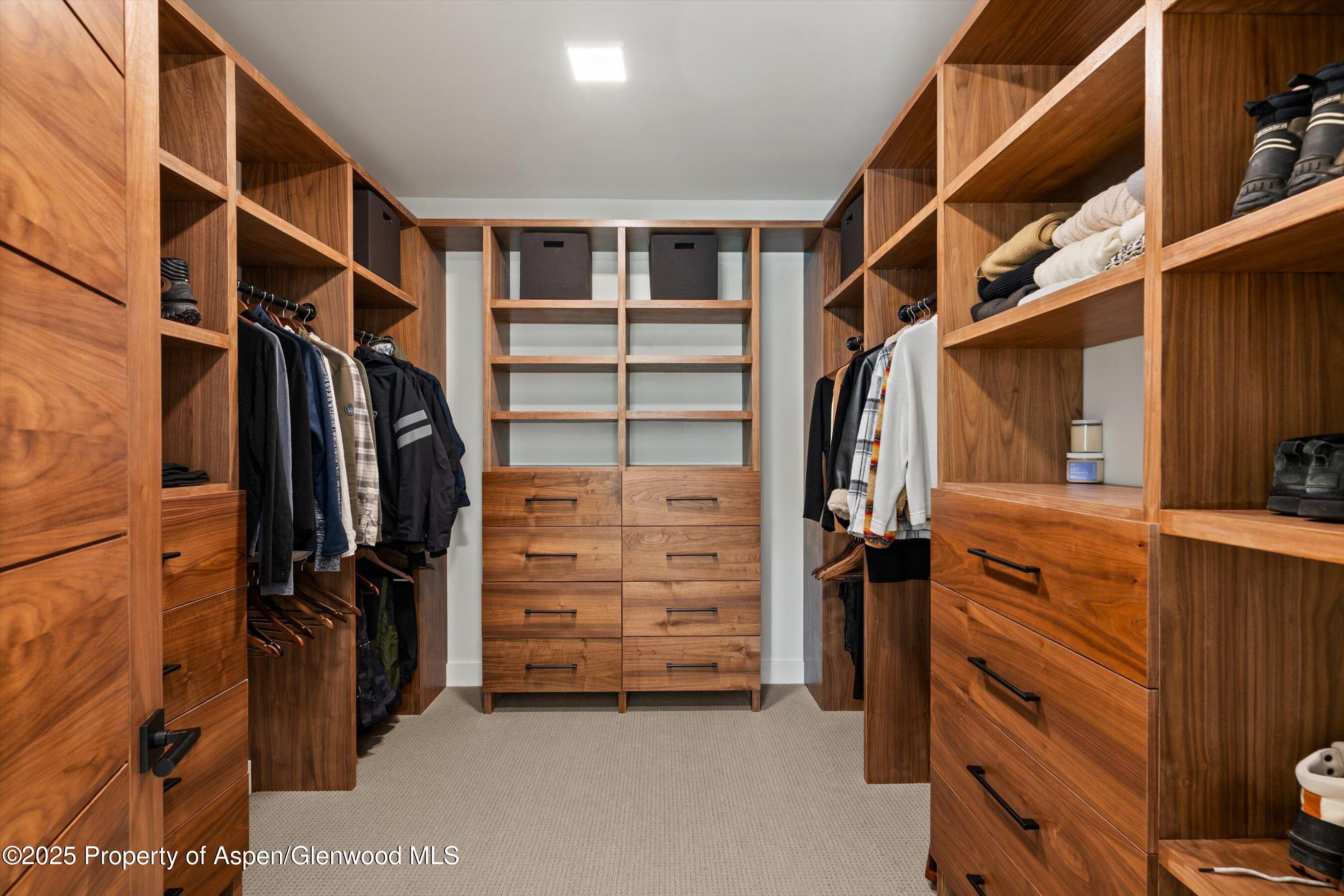 1234 Wood Road Snowmass Village, CO 81615 - Photo 46 of 66 a view of walk in closet with clothes