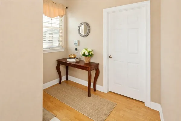 a view of a room with a table and a chair