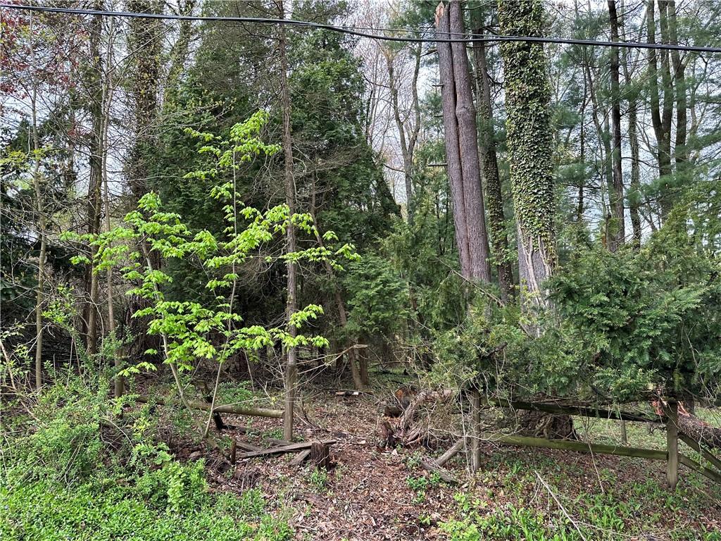 Lot 15 Woodlawn Road Butler, PA 16001 - Photo 1 of 4 a backyard of a house with lots of green space and a fountain