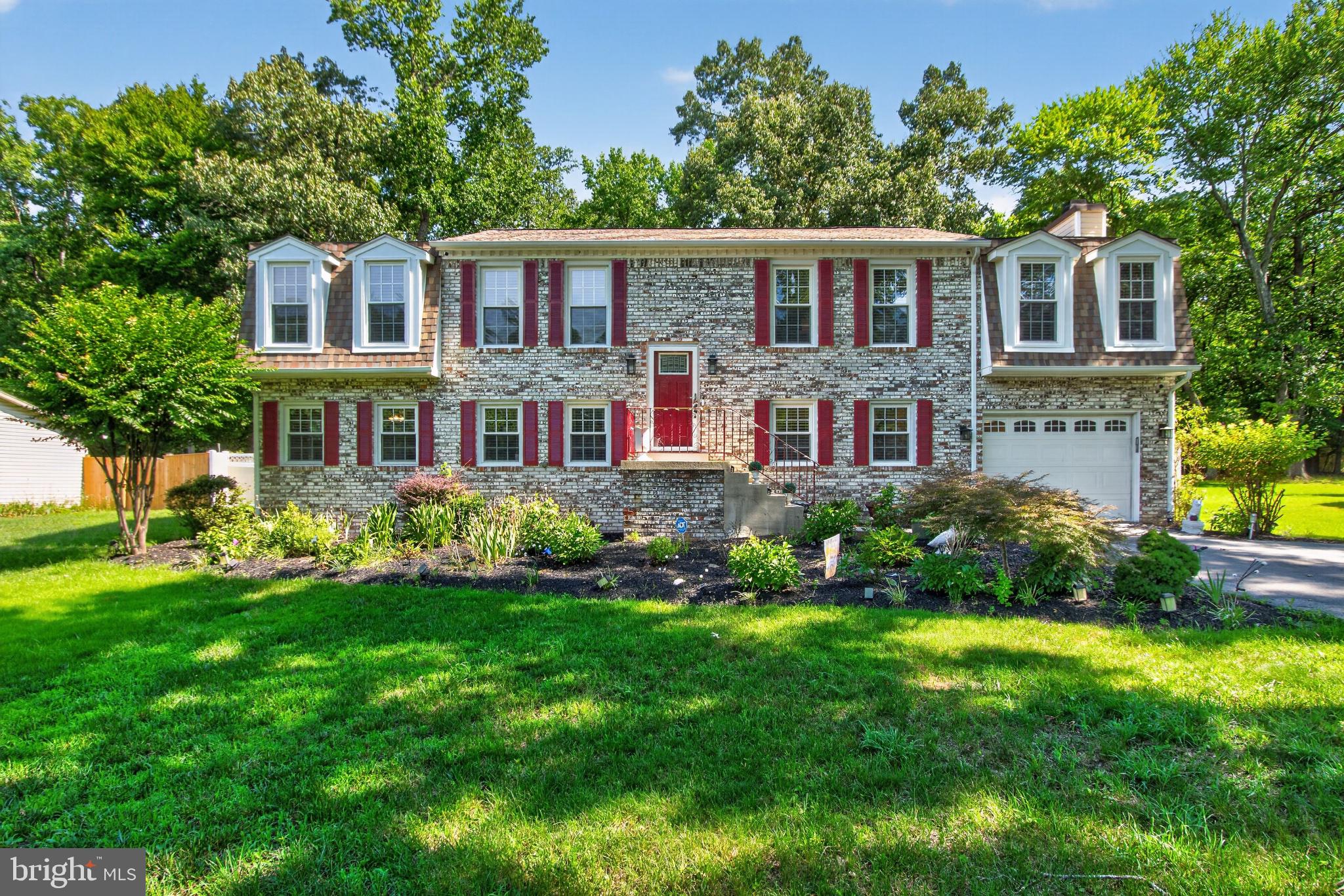 2816 Ridge Road Waldorf, MD 20603 - Photo 1 of 33 Classic stone colonial with red shutters.