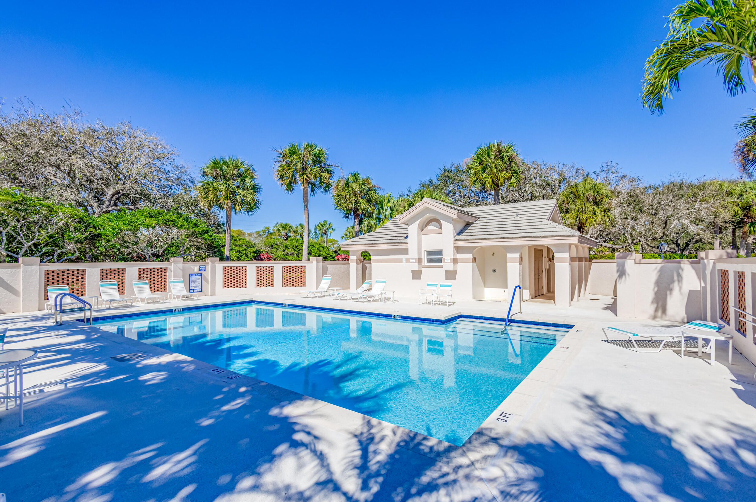 16501 Riverwind Drive Jupiter, FL 33477 - Photo 49 of 50 a view of a house with a patio