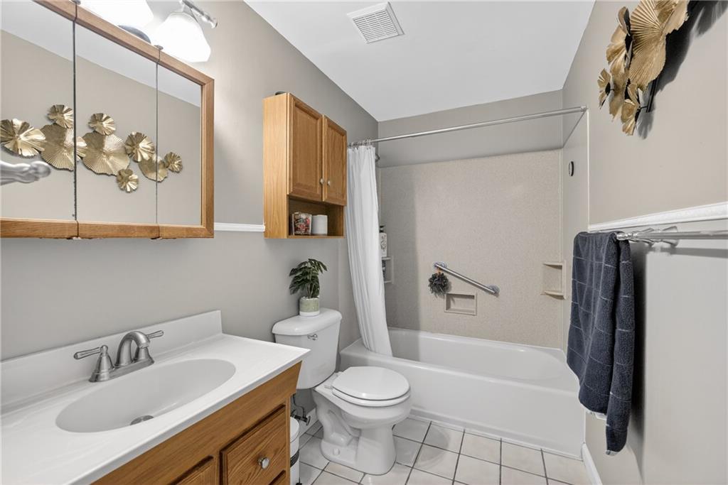 1304 Greenhill Rd Extension Pittsburgh, PA 15209 - Photo 11 of 31 a bathroom with a sink toilet and shower