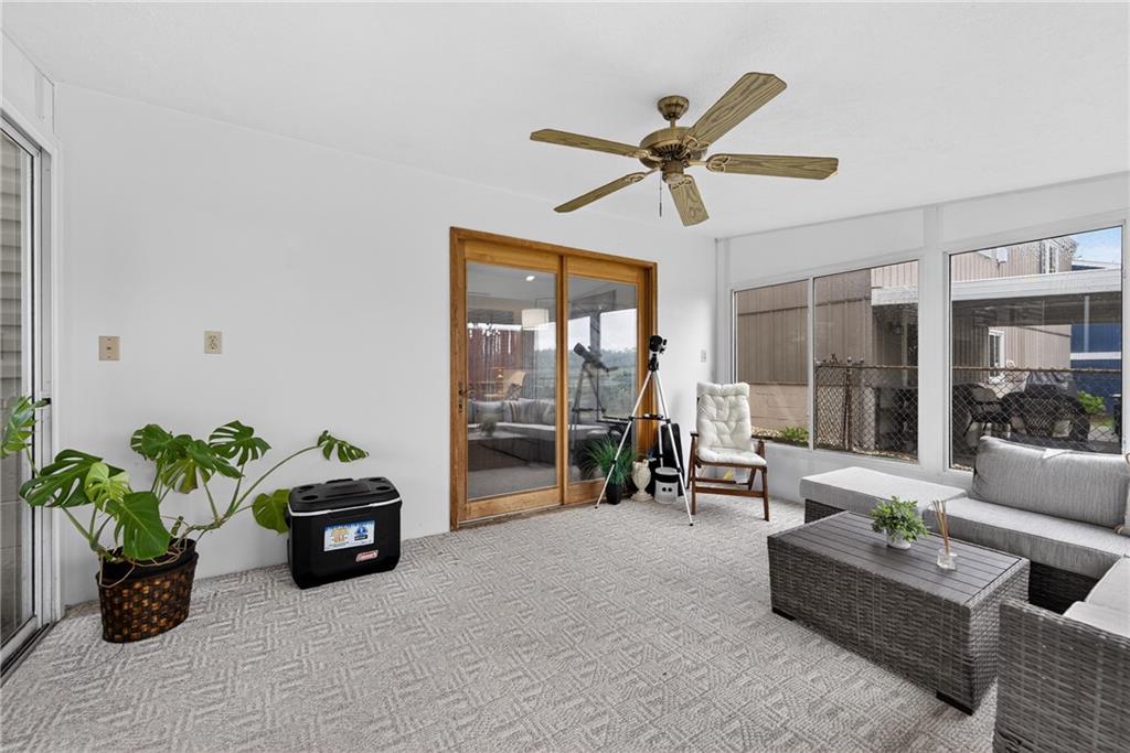 1304 Greenhill Rd Extension Pittsburgh, PA 15209 - Photo 24 of 31 a living room with furniture and a potted plant
