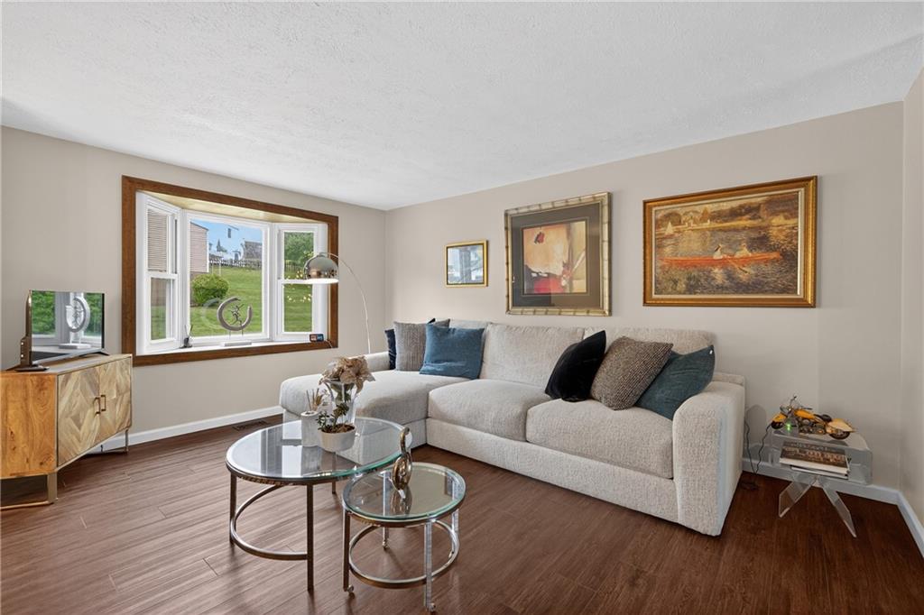 1304 Greenhill Rd Extension Pittsburgh, PA 15209 - Photo 3 of 31 a living room with furniture and wooden floor