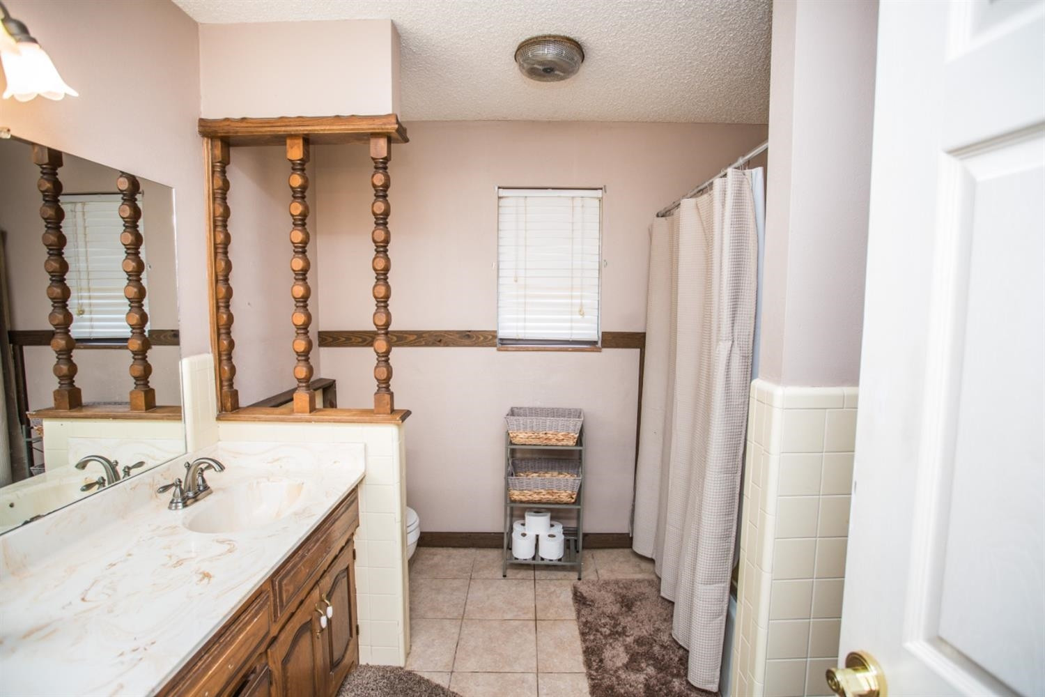 2118 Tech Drive Levelland, TX 79336 - Photo 18 of 42 a bathroom with a sink double vanity and a mirror