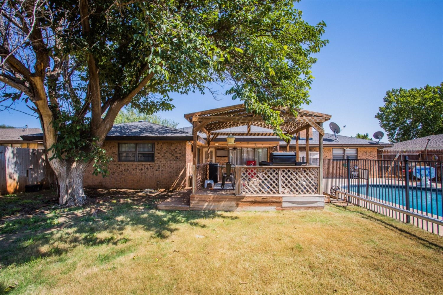 2118 Tech Drive Levelland, TX 79336 - Photo 25 of 42 a front view of a house with a yard