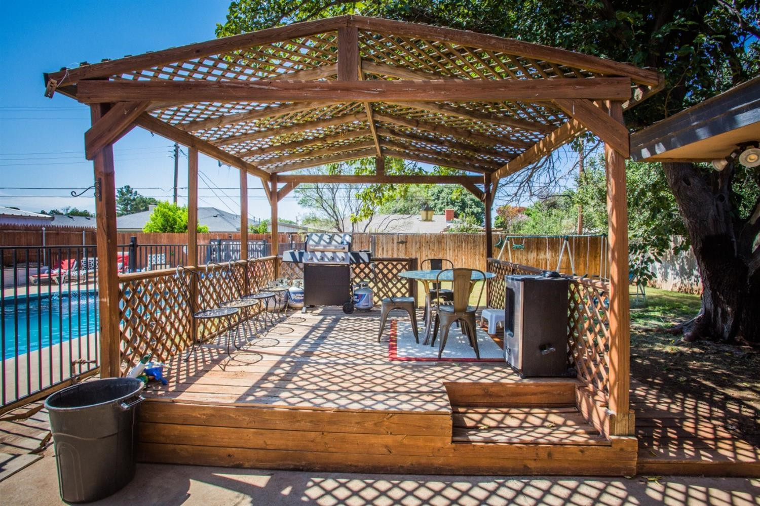 2118 Tech Drive Levelland, TX 79336 - Photo 26 of 42 a patio with glass top table and chairs