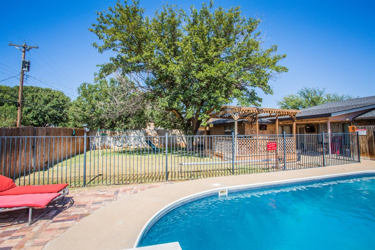 2118 Tech Drive Levelland, TX 79336 - Photo 28 of 42 a view of a tennis ground with a small pool